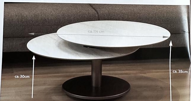 Couchtisch Jupiter mit eingezeichneten Maßangaben: Breite geöffnet ca. 114 cm, Höhe mit Bodenplatte ca. 30 / 38 cm.